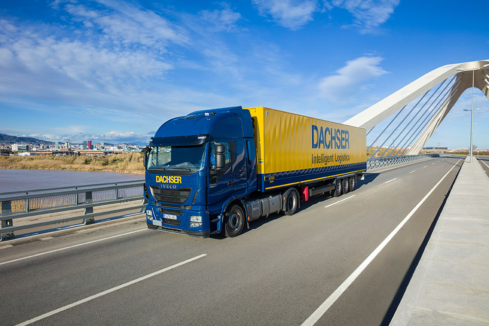 A Dachser lorry on the road.