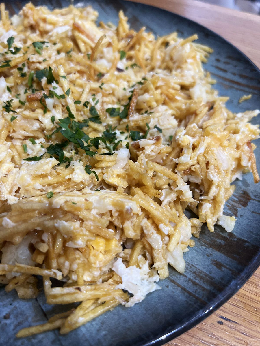 Una ración de miajas de bacalao en el restaurante A de Arco.