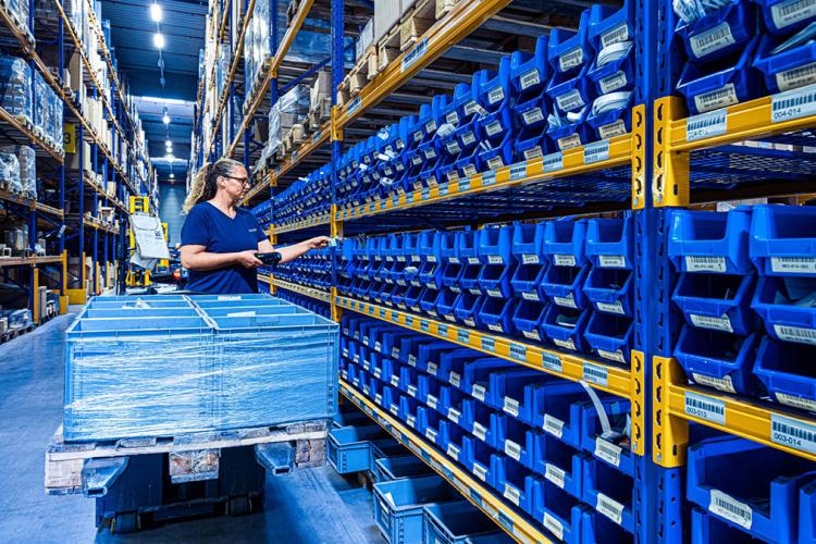 Placing items in a Dachser storage facility.
