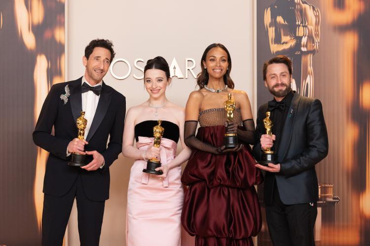 Award winners with their Oscars, credit to Etienne Laurent.